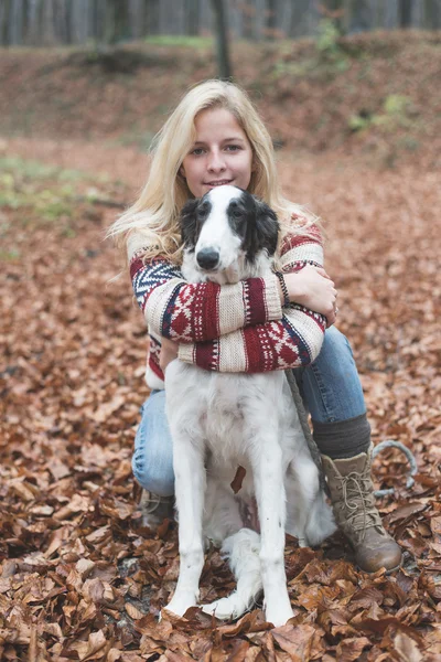 Woman embraced her   Borzoi dog — Zdjęcie stockowe