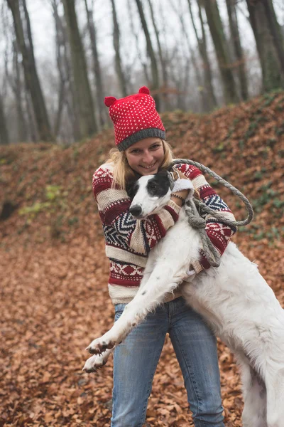 Woman embraced Borzoi dog — Stock Image Woman embraced Borzoi dog Stock Photo