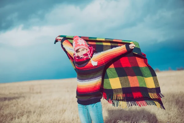 Nomadic woman holding blanket — Stock Photo, Image