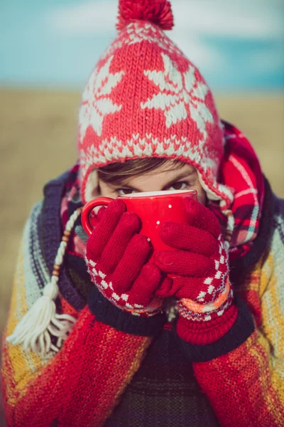 Winter girl drinking tea or coffee — 스톡 사진