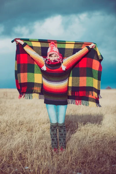 Happy free woman with warm blanket — Stock Photo, Image