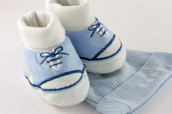 Baby stuff and shoes isolated on white — Stock Photo, Image