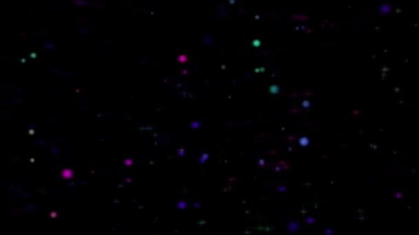 Анімований рух кольорових частинок на чорному тлі — стокове відео