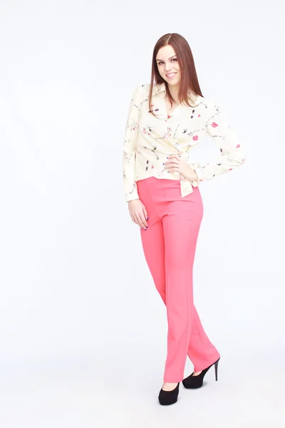 Vrouw in roze broek — Stockfoto