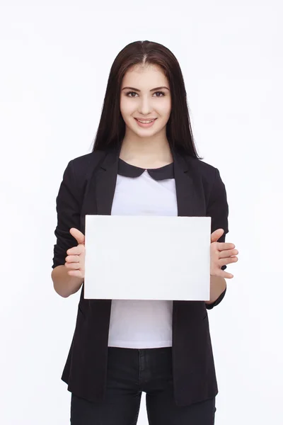 Happy woman holding white blank paper — Stock Photo, Image