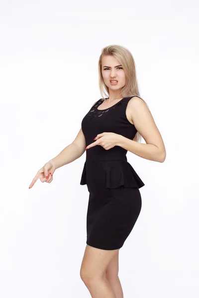 Young angry woman in black dress — Stock Photo, Image