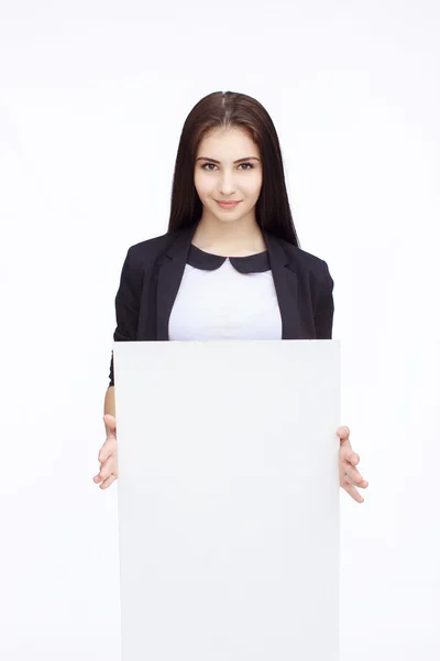 Happy woman holding white blank paper — Stock Photo, Image
