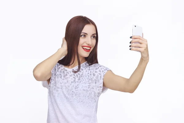 Jeune femme heureuse avec téléphone portable — Photo
