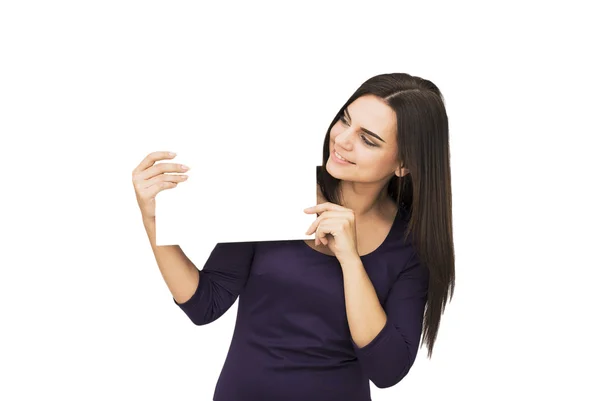 Happy woman holding white blank paper — Stock Photo, Image