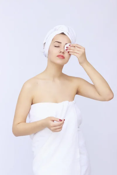 Young beautiful woman wrapped in towel — Stock Photo, Image