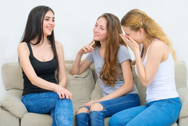 Portrait of three happy pretty young women at home — Stock Photo, Image