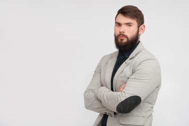Sakallı yakışıklı bir adamın portresi.