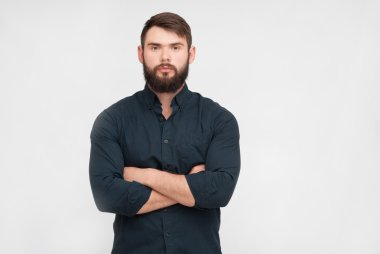 Sakallı yakışıklı bir adamın portresi.