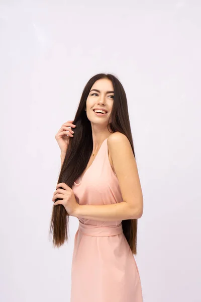 Young woman with long hair. Brunette — Stock Photo, Image