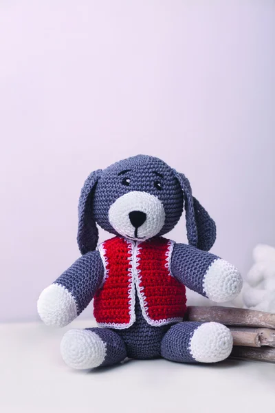 Christmas knitted toy dog — Stock Photo, Image