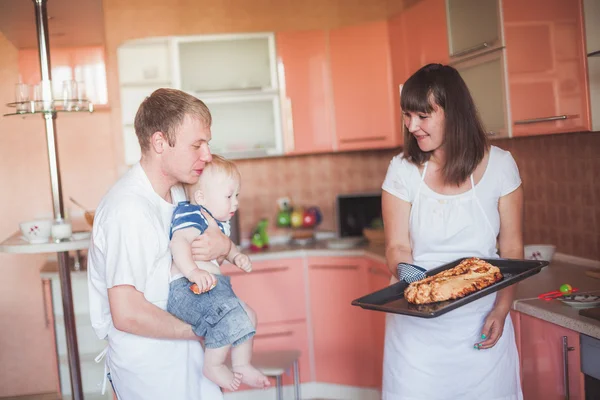 Happy family at kitchen — Stock Photo, Image