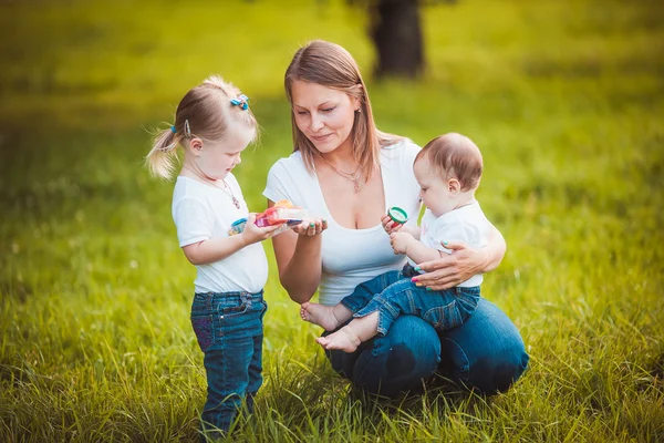 Happy mother with daughters — Stock Photo, Image