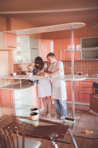 Happy family at kitchen — Stock Photo, Image