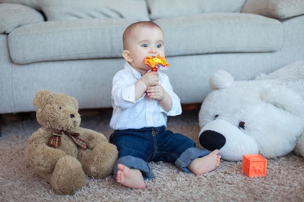 Baby boy with toys — Stock Photo, Image