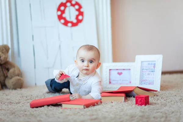 Funny baby with books — Stock Photo, Image