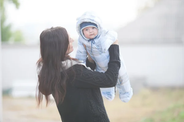 Young mother with baby — Stock Photo, Image