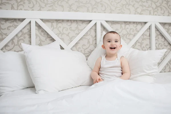 Cute baby boy in bed — Stock Photo, Image