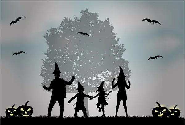 Halloween - silhuetten av en familj. — Stock vektor