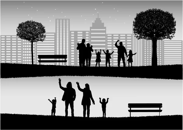 Family silhouettes in nature. — Stock Vector