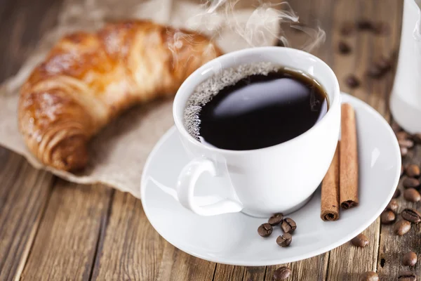 Delicious coffee with sweets on a wooden table — Stock Photo, Image