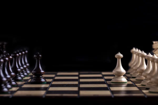 Chess pieces on a board Stock Picture