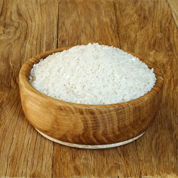 Rice camolino in a wooden bowl — Stock Photo, Image
