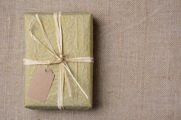 Gold Wrapped Christmas Present — Stock Photo, Image