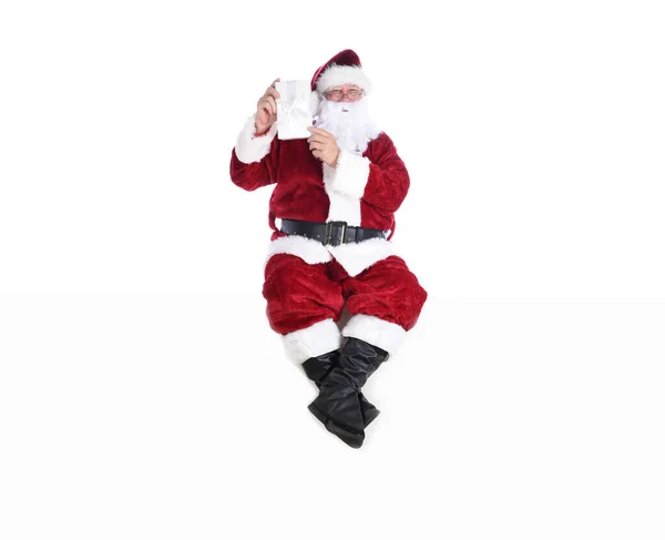 Senior Man Traditional Santa Claus Suit Sitting White Wall Holding — Stock Photo, Image