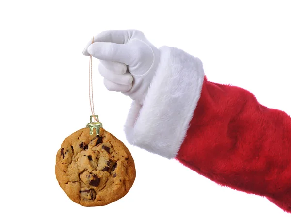 Der Weihnachtsmann Hält Eine Weihnachtsanhänger Mit Chocolate Chip Cookie Isoliert — Stockfoto