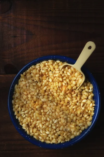 Bowl Full Popcorn Kernels Scoop Rustic Dark Wood Table Vertical — Stock Photo, Image