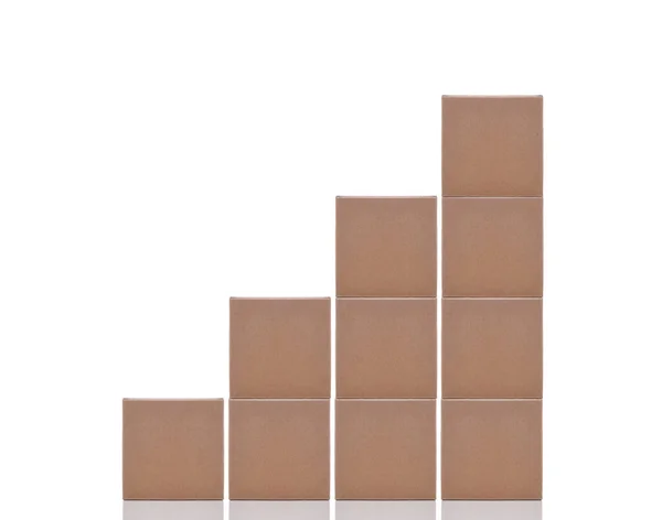 Business Concept Stacked Cardboard Boxes Forming Bar Graph Isolated White — Stock Photo, Image