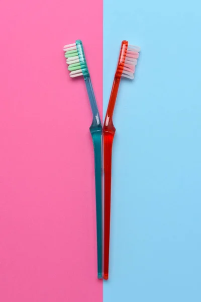 Дві Зубні Щітки Рожевому Синьому Тлі Плавний Простір Високого Кута — стокове фото