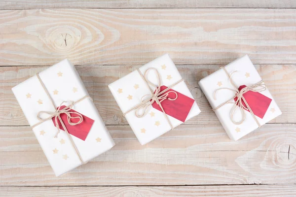 White Christmas Presents Red Tags — Stock Photo, Image