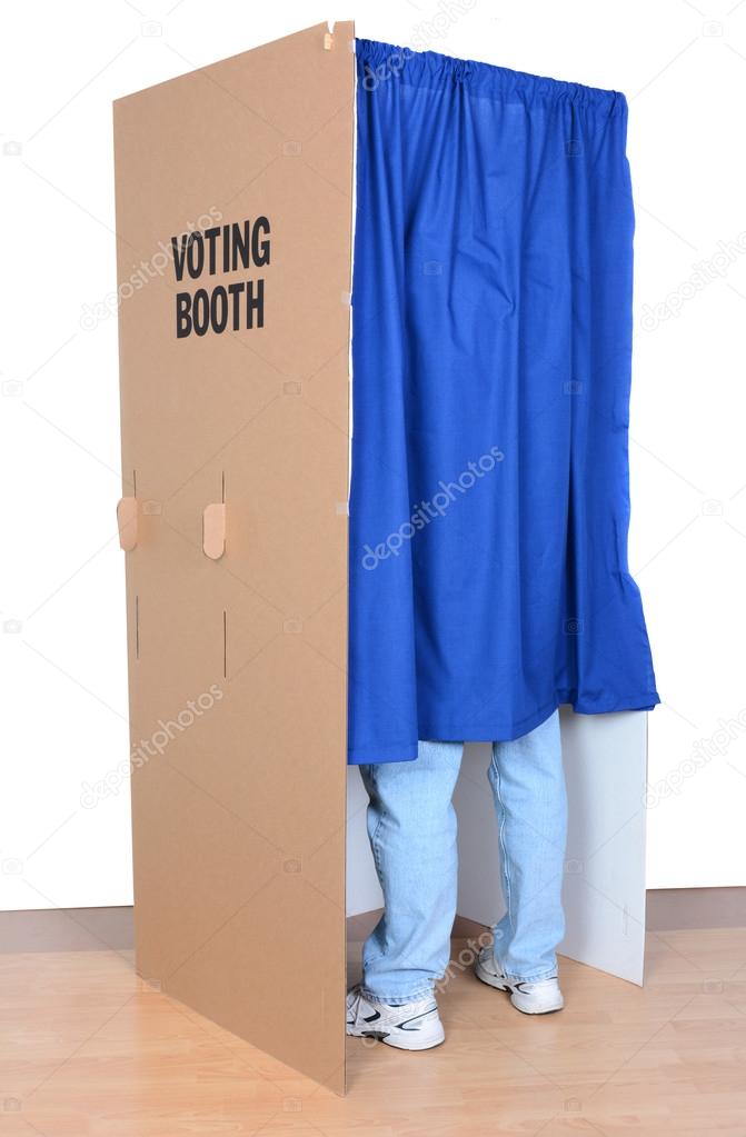 Man Standing in Voting Booth