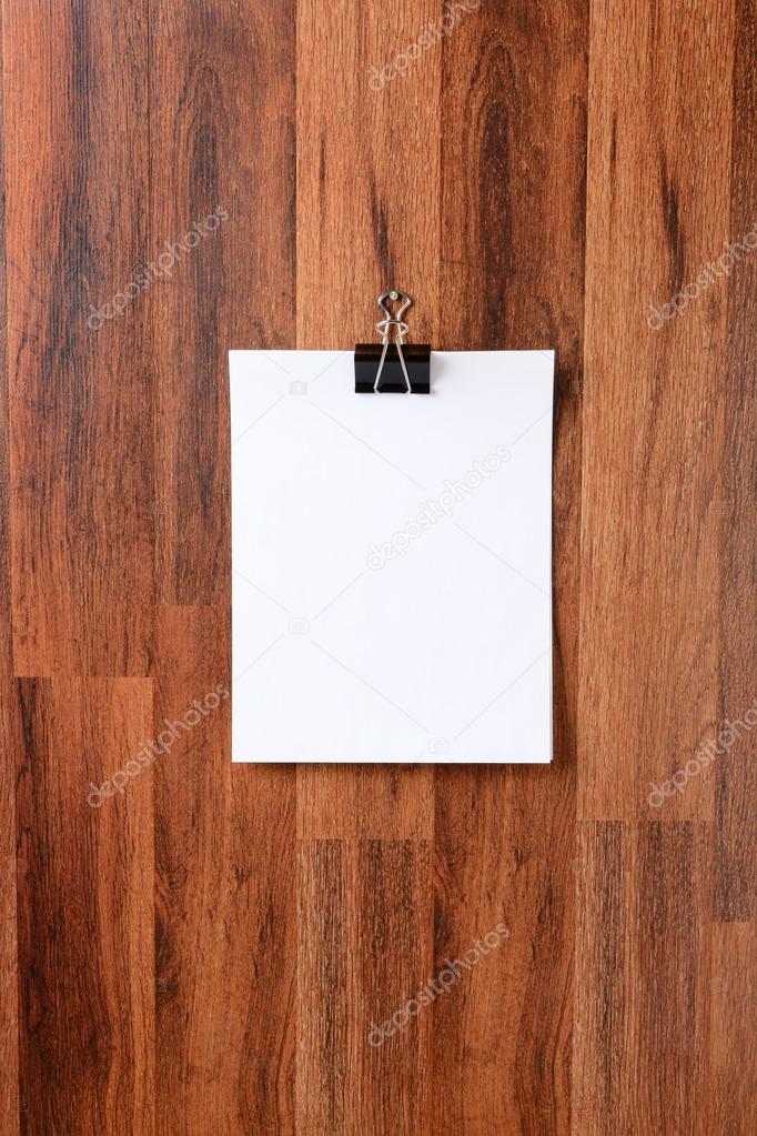 Blank Paper Hanging on Wall