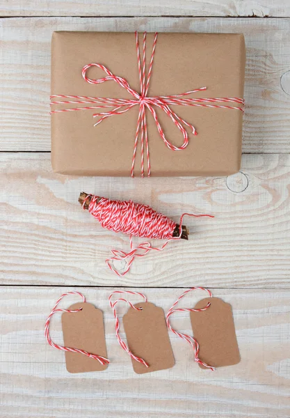 Plain Wrapped Present String and Tags — Stock Photo, Image