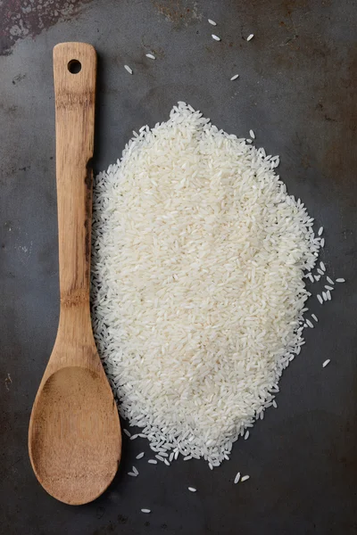 Rice and Wooden Spoon Royalty Free Stock Images
