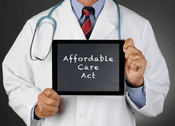 Doutor Tablet Computer Affordable Care Act — Fotografia de Stock