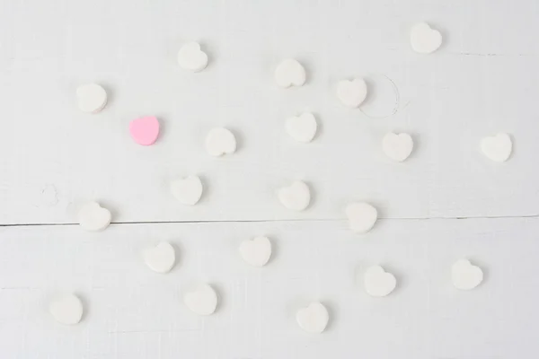 One Pink Heart Among White Hearts — Stock Photo, Image