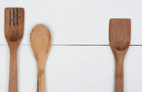 Utensílios de cozinha de madeira três — Fotografia de Stock