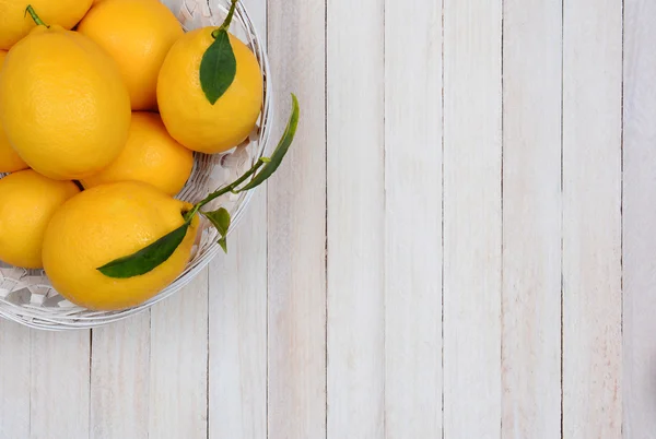 Basket of Lemons in Corner — Stock Photo, Image