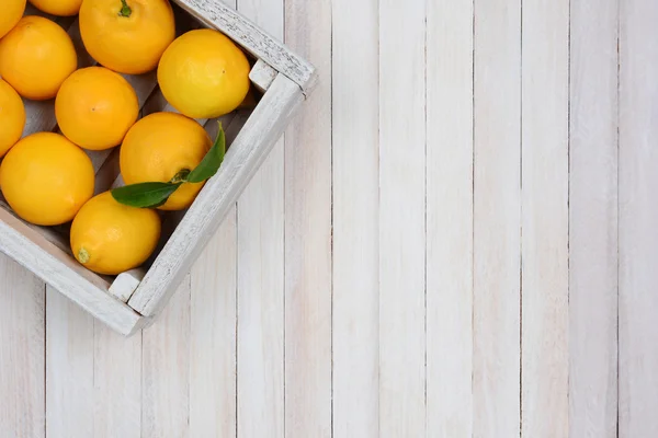Krat van citroenen — Stockfoto
