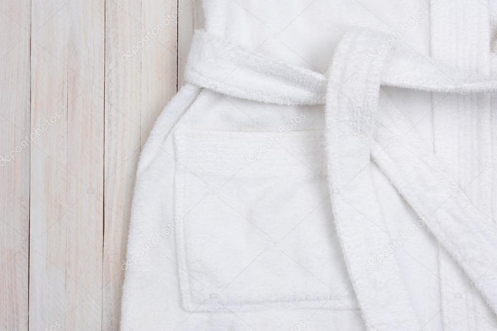 Bathrobe on White Wood Table