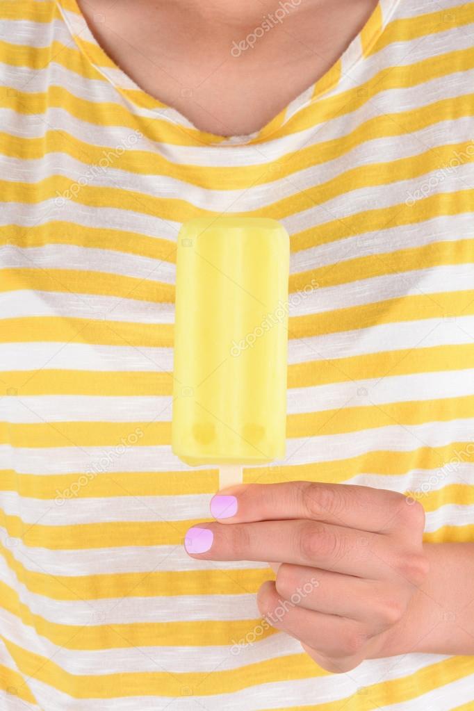 Woman Holding Lemon Ice Pop