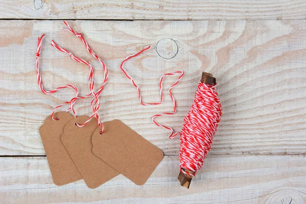 Christmas Gift Tags and String — Stock Photo, Image